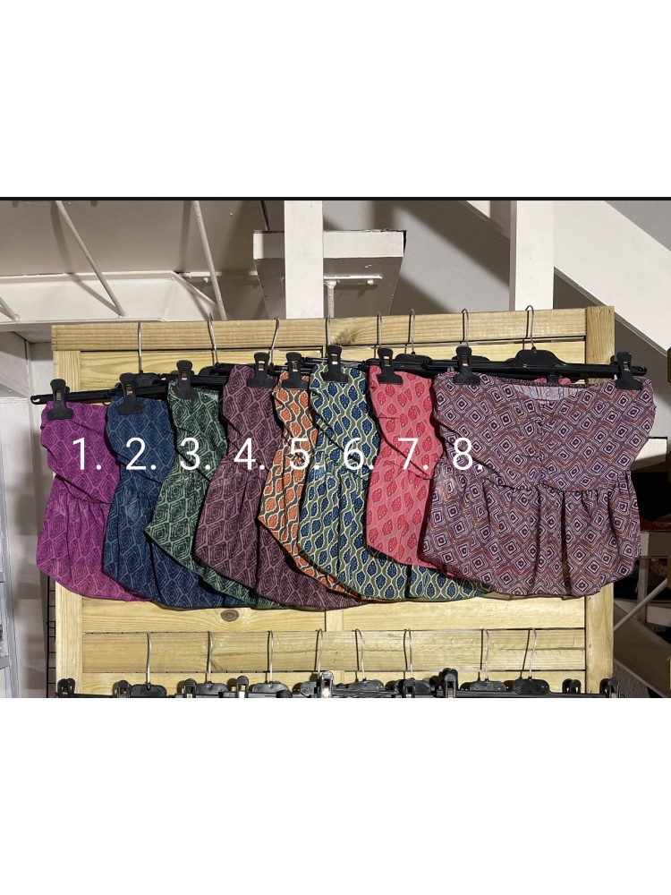 Top gasa frunce estampado pompom