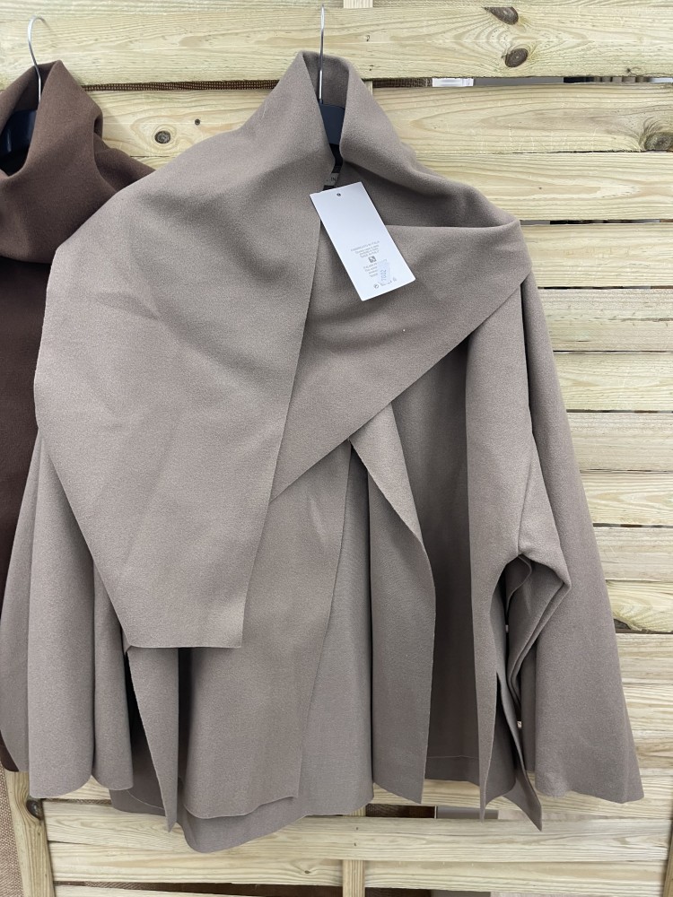 Capa de paño cruzada