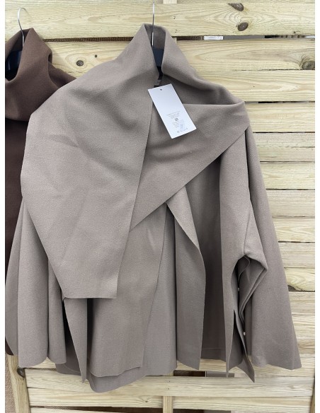 Capa de paño cruzada