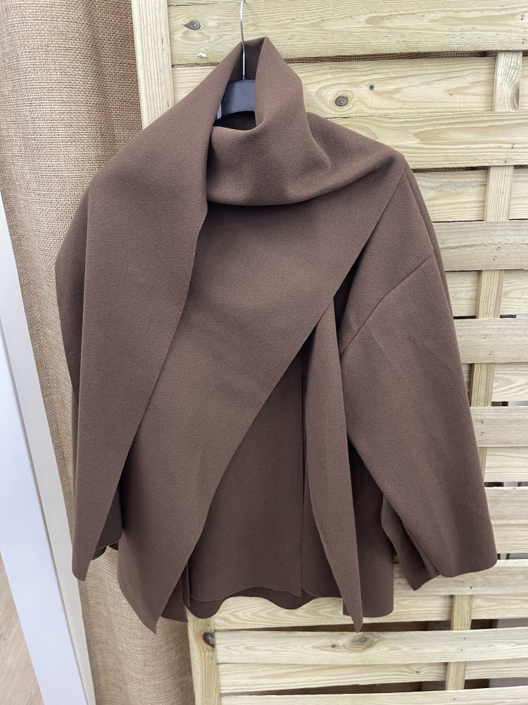 Capa de paño cruzada