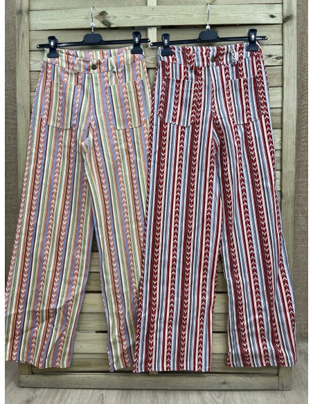 Jeans espigas verticales con botones