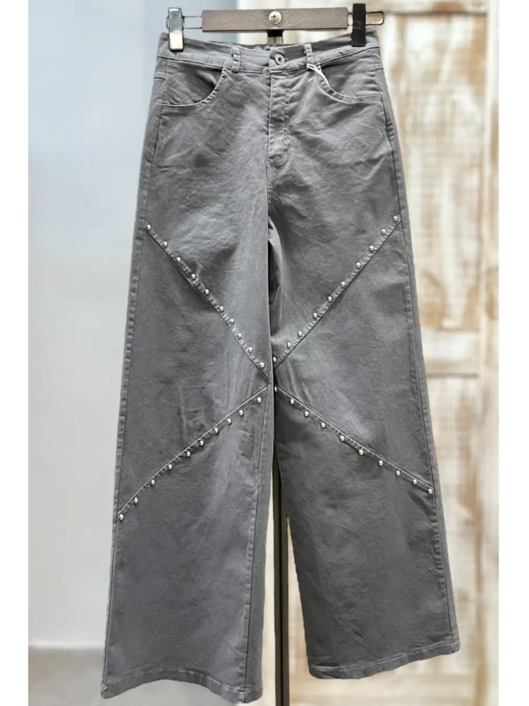 Jeans tachas delanteras en diagonal