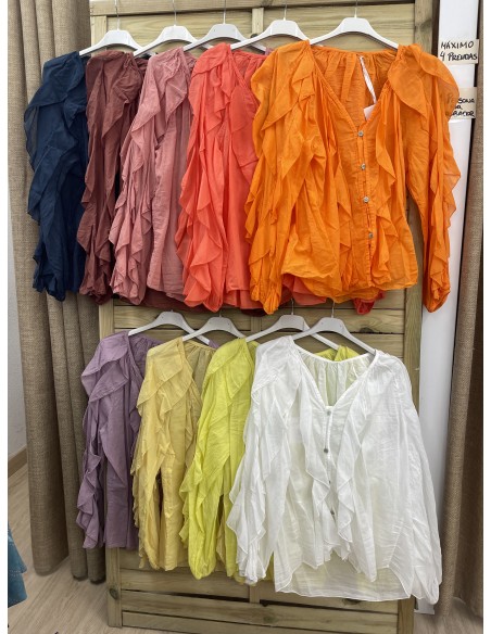 Camisa en pico con vuelo vertical