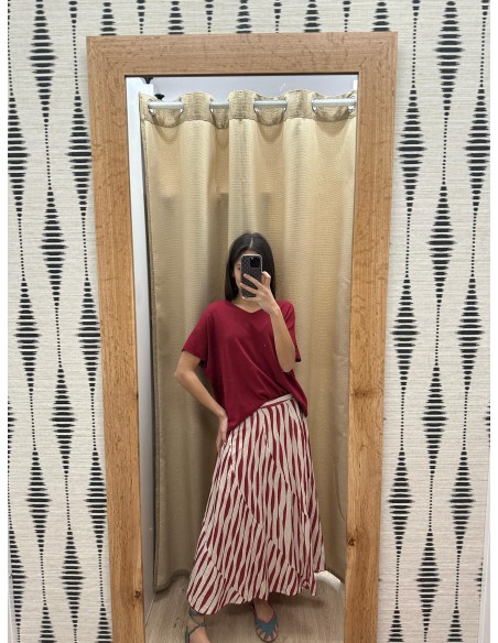 Falda midi evasé capas diagonales