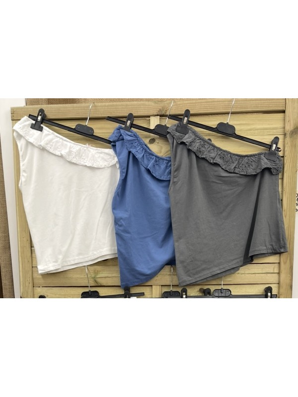 Top asimétrico volante brocado