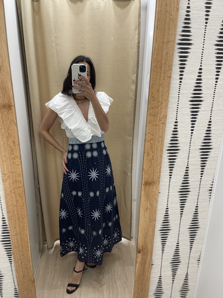 Falda midi detalles soles bordados