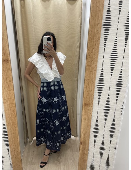 Falda midi detalles soles bordados