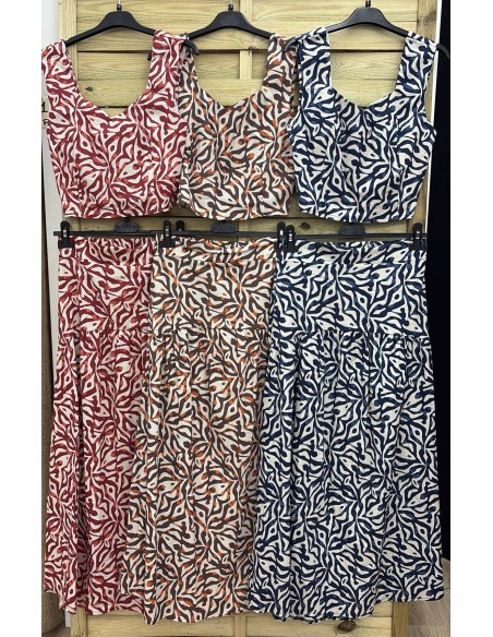 Conjunto laberinto de top de sisa y falda midi corte en cadera