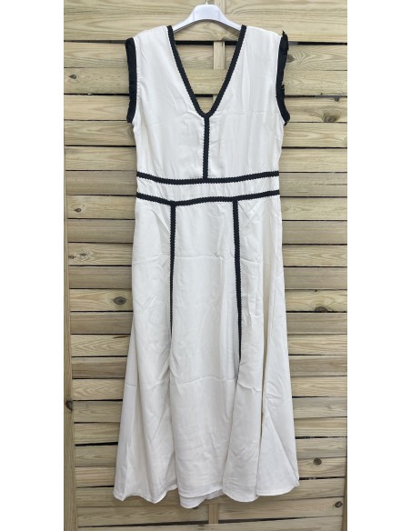 Vestido midi lineas con hombreras y flequitos en sisa