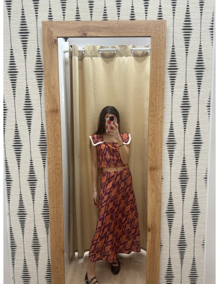 Conjunto rombos difuminados con top solapas con flequitos y falda