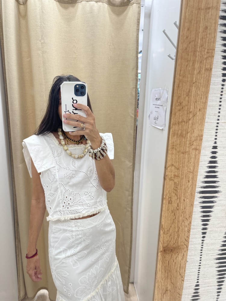 Conjunto liso brocado de top y falda detalle flequitos