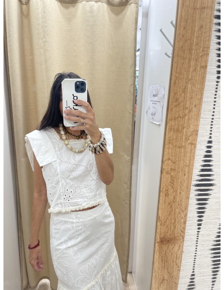 Conjunto liso brocado de top y falda detalle flequitos