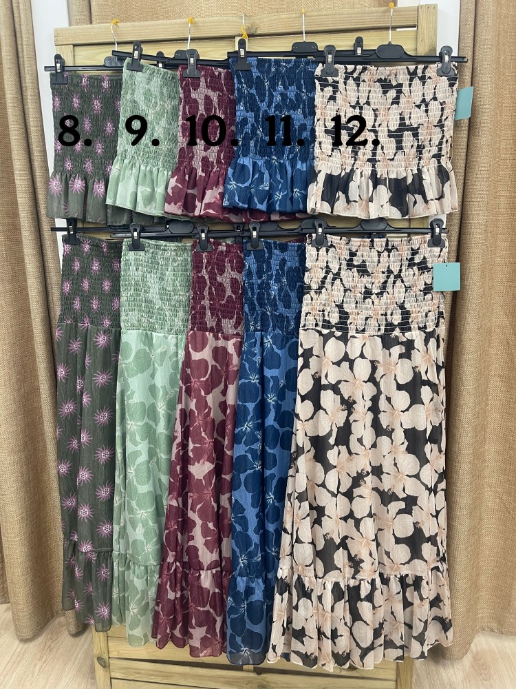 Conjunto de top palabra fruncido y falda larga con brillito