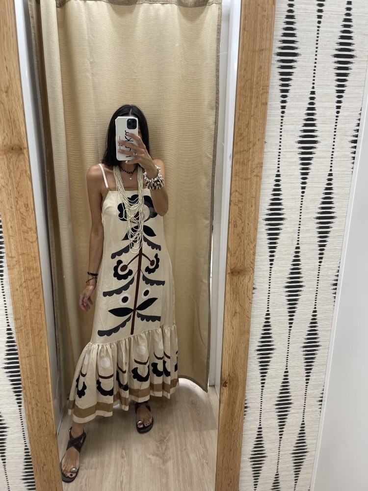 Vestido de tiranta fina con cenefa delantera y vuelo en bajo