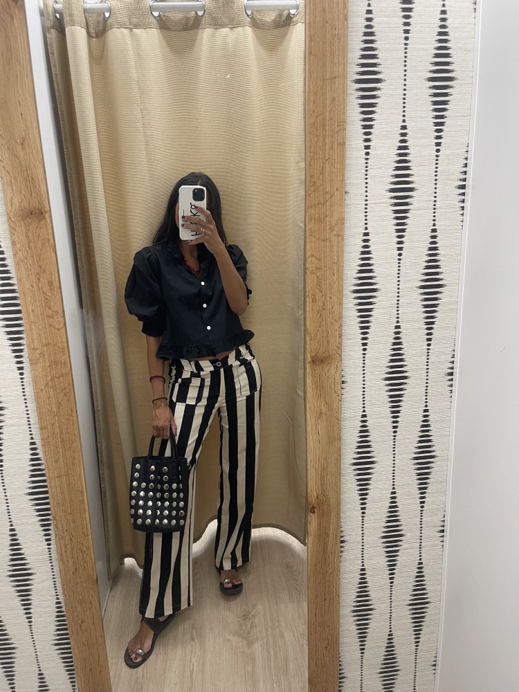 Pantalon raya media vertical con bolsillo