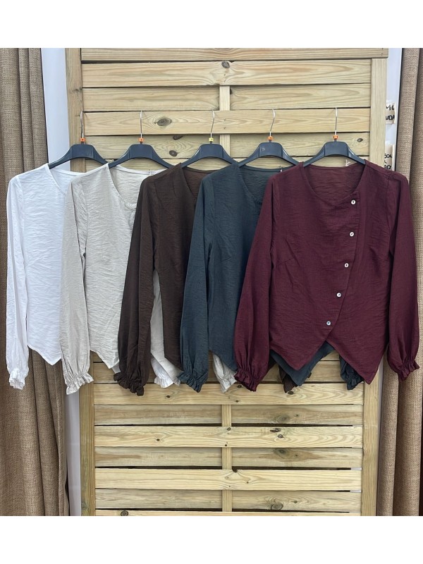 Camisa básica botones en diagonal con abertura