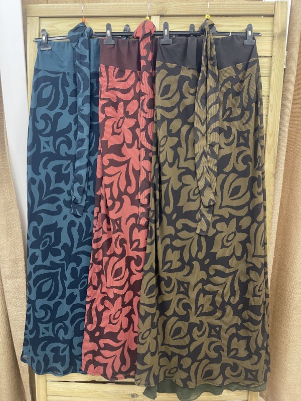 Vestido palabra estampado con pecho liso y lazo