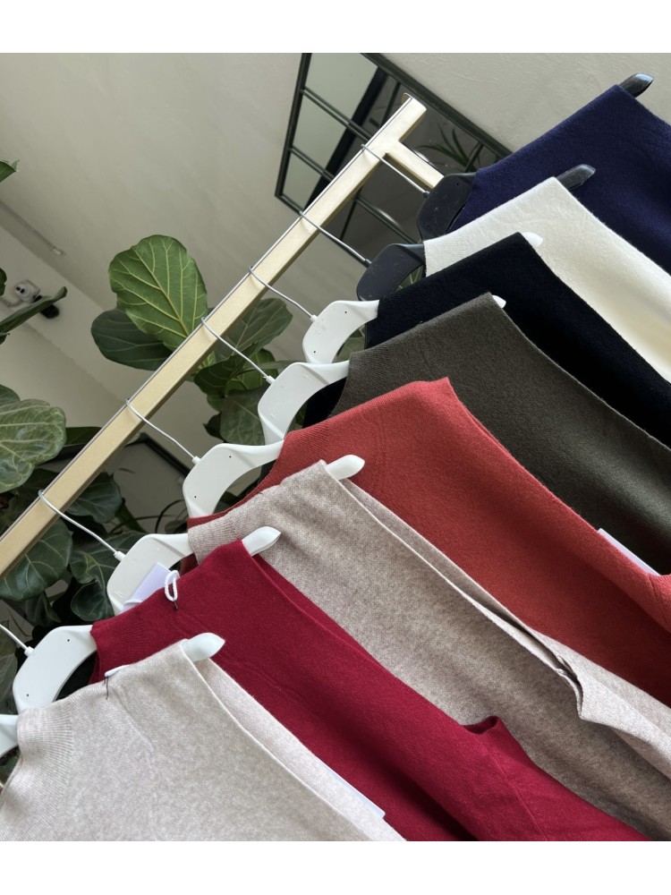 Chaleco largo cerrado asimétrico