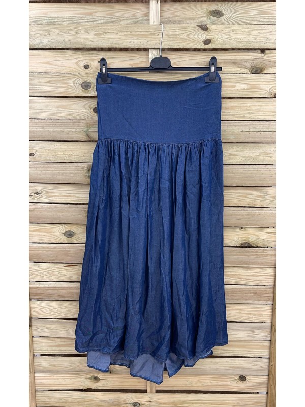 Falda vaquera corte en cadera y vuelo