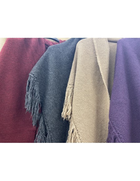 Poncho de flecos