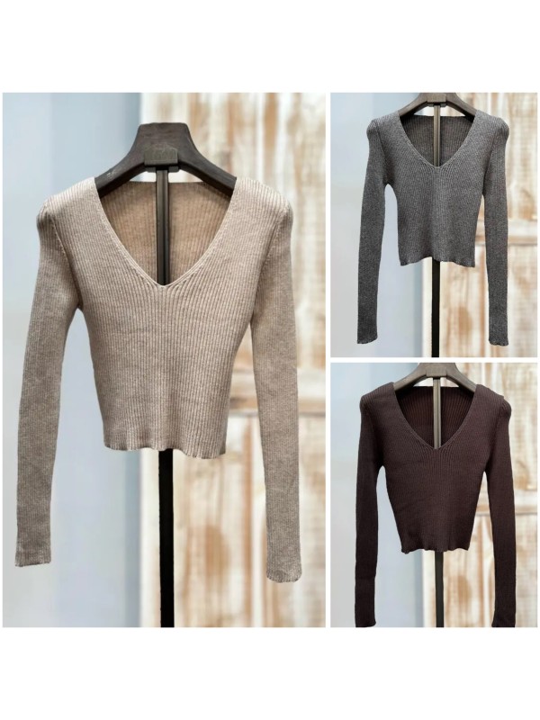 Jersey ajustado de canalé con escote en pico