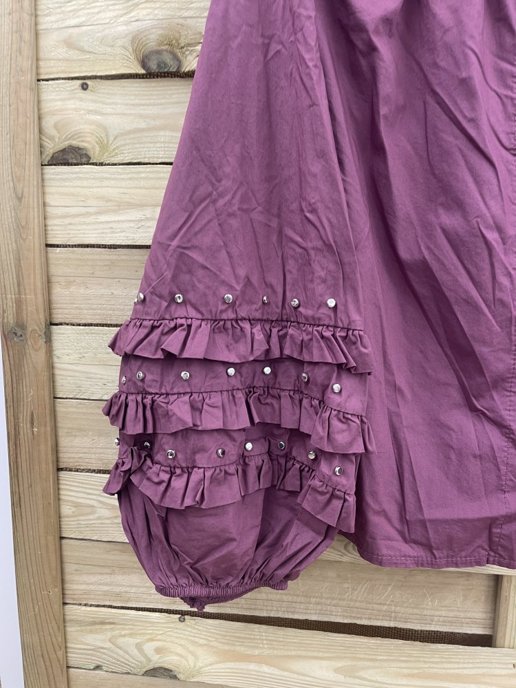 Camisa triple volantito en mangas con tachas