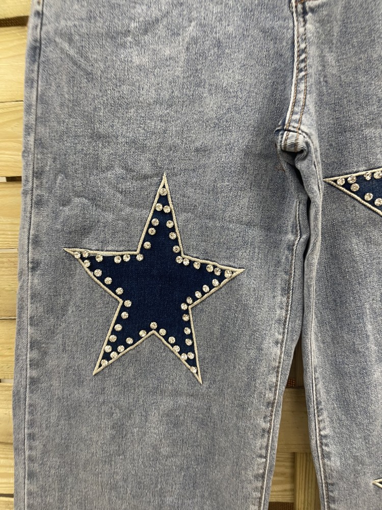 Jeans maxi estrellas delanteras con tachas